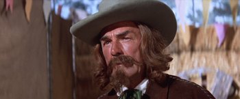 Movie still from “Ride the High Country” (1962), directed by Sam Peckinpah – A person wearing a hat; Close Up shot, Low angle