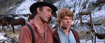 Movie still from “Ride the High Country” (1962), directed by Sam Peckinpah – A man and a woman standing next to each other; Close Up shot, Low angle