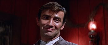 Movie still from “Ride the High Country” (1962), directed by Sam Peckinpah – A person wearing a suit and tie; Close Up shot, Low angle