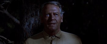 Movie still from “Ride the High Country” (1962), directed by Sam Peckinpah – An older man in a yellow shirt stares at the camera; Close Up shot, Low angle