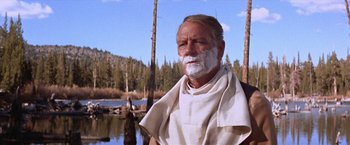 Movie still from “Ride the High Country” (1962), directed by Sam Peckinpah – A man with a towel around his neck and a towel around his neck; Close Up shot, Low angle