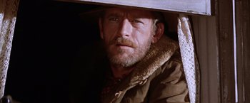 Movie still from “Ride the High Country” (1962), directed by Sam Peckinpah – A person wearing a hat; Close Up shot, Over the shoulder angle