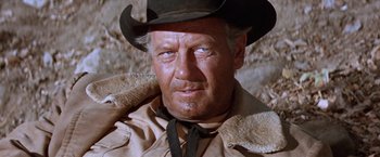 Movie still from “Ride the High Country” (1962), directed by Sam Peckinpah – A person wearing a cowboy hat; Close Up shot, Low angle