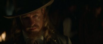 Movie still from “Ride with the Devil” (1999), directed by Ang Lee – A person wearing a hat; Close Up shot, Over the shoulder angle