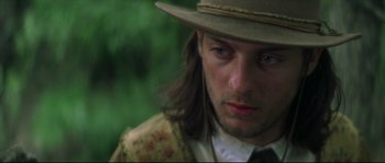Movie still from “Ride with the Devil” (1999), directed by Ang Lee – A person wearing a hat; Close Up shot, Low angle