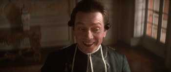 Movie still from “Ridicule” (1996), directed by Patrice Leconte – A person wearing a uniform; Close Up shot, Low angle