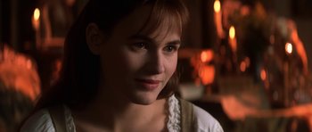 Movie still from “Ridicule” (1996), directed by Patrice Leconte – A person wearing a white shirt; Close Up shot, Over the shoulder angle