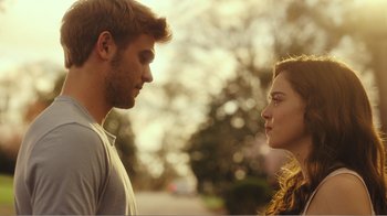 Movie still from “Rings” (2017), directed by F. Javier Gutiérrez – A man and a woman face to face on a street; Close Up shot, Over the shoulder angle