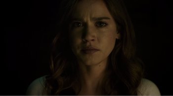 Movie still from “Rings” (2017), directed by F. Javier Gutiérrez – A person staring at the camera; Close Up shot, Over the shoulder angle