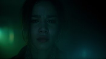 Movie still from “Rings” (2017), directed by F. Javier Gutiérrez – A person looking at the camera; Close Up shot, Low angle