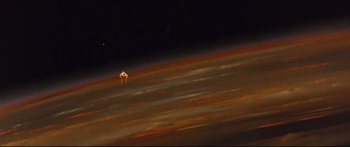 Movie still from “Robinson Crusoe on Mars” (1964), directed by Byron Haskin – An image of an airplane flying in the sky at night; Extreme Wide shot, Overhead angle