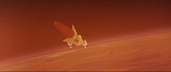 Movie still from “Robinson Crusoe on Mars” (1964), directed by Byron Haskin – An image of an airplane flying through the sky; Extreme Wide shot, Overhead angle