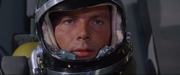 Movie still from “Robinson Crusoe on Mars” (1964), directed by Byron Haskin – A person wearing a helmet; Close Up shot, Overhead angle