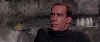 Movie still from “Robinson Crusoe on Mars” (1964), directed by Byron Haskin – A person wearing a black shirt; Close Up shot, Low angle