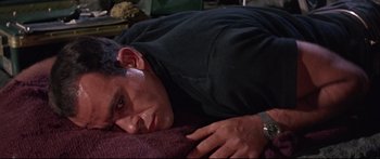 Movie still from “Robinson Crusoe on Mars” (1964), directed by Byron Haskin – A person laying on a bed; Close Up shot, High angle