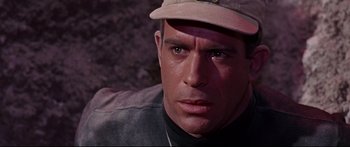 Movie still from “Robinson Crusoe on Mars” (1964), directed by Byron Haskin – A person wearing a hat; Close Up shot, Over the shoulder angle