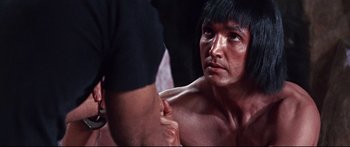 Movie still from “Robinson Crusoe on Mars” (1964), directed by Byron Haskin – A person with a hand on his shoulder; Close Up shot, Over the shoulder angle