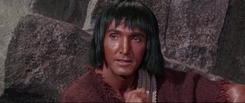 Movie still from “Robinson Crusoe on Mars” (1964), directed by Byron Haskin – A person wearing a wig; Close Up shot, High angle