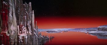 Movie still from “Robinson Crusoe on Mars” (1964), directed by Byron Haskin – An oil painting of a red sky and a body of water; Extreme Wide shot, Low angle