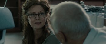 Movie still from “Robot & Frank” (2012), directed by Jake Schreier – An older man and a younger woman sitting in front of each other; Close Up shot, Over the shoulder angle