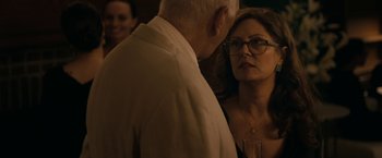 Movie still from “Robot & Frank” (2012), directed by Jake Schreier – An older man and a younger woman standing next to each other; Close Up shot, Over the shoulder angle