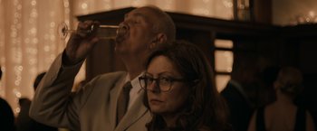 Movie still from “Robot & Frank” (2012), directed by Jake Schreier – A man and a woman are drinking from a glass; Close Up shot, Over the shoulder angle