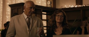 Movie still from “Robot & Frank” (2012), directed by Jake Schreier – An older man and a younger woman standing next to each other; Medium shot, Over the shoulder angle