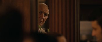 Movie still from “Robot & Frank” (2012), directed by Jake Schreier – An older man looking into a mirror; Close Up shot, Over the shoulder angle
