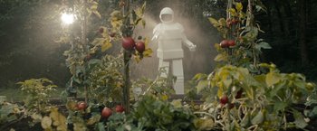 Movie still from “Robot & Frank” (2012), directed by Jake Schreier – An image of a statue in the middle of a garden; Wide shot, Low angle