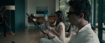 Movie still from “Robot & Frank” (2012), directed by Jake Schreier – A man and a woman looking at a cell phone; Close Up shot, Over the shoulder angle