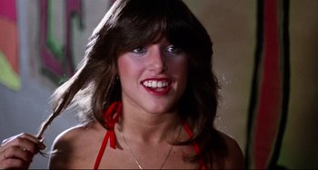 Movie still from “Rock 'n' Roll High School” (1979), directed by Joe Dante – A person with long hair; Close Up shot, Low angle