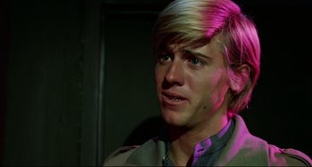 Movie still from “Rock 'n' Roll High School” (1979), directed by Joe Dante – A person wearing a jacket; Close Up shot, Over the shoulder angle