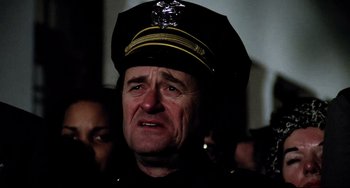 Movie still from “Rock 'n' Roll High School” (1979), directed by Joe Dante – A person wearing a hat; Close Up shot, Low angle