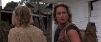 Movie still from “Romancing the Stone” (1984), directed by Robert Zemeckis – A person with long blonde hair; Close Up shot, Low angle