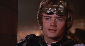 Movie still from “Romeo and Juliet” (1968), directed by Franco Zeffirelli – A person wearing a helmet; Close Up shot, Over the shoulder angle