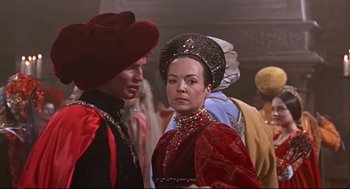 Movie still from “Romeo and Juliet” (1968), directed by Franco Zeffirelli – A man and a woman dressed in medieval clothing; Medium shot, Over the shoulder angle