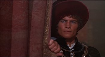 Movie still from “Romeo and Juliet” (1968), directed by Franco Zeffirelli – A person wearing a hat; Close Up shot, High angle