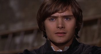 Movie still from “Romeo and Juliet” (1968), directed by Franco Zeffirelli – A person with long brown hair; Close Up shot, High angle