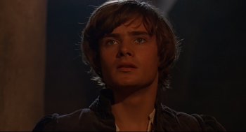 Movie still from “Romeo and Juliet” (1968), directed by Franco Zeffirelli – A man with long brown hair and blue eyes; Close Up shot, Low angle