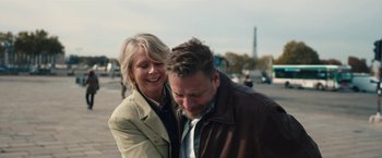 Movie still from “Rose” (2022), directed by Niels Arden Oplev – An older woman standing next to an older man; Medium shot, High angle