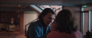 Movie still from “Rose” (2022), directed by Niels Arden Oplev – A woman is talking to another woman in front of a building; Close Up shot, Over the shoulder angle