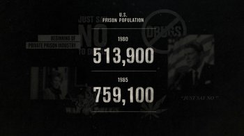 Movie still from “13th” (2016), directed by Ava DuVernay – A black and white photo of the number of people in prison; Extreme Close Up shot, Overhead angle