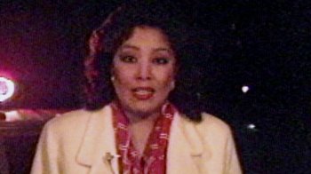 Movie still from “13th” (2016), directed by Ava DuVernay – An old photo of a woman in a white jacket; Close Up shot, High angle