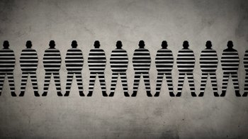 Movie still from “13th” (2016), directed by Ava DuVernay – A group of people that are standing in a row; Wide shot, Overhead angle