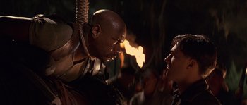 Movie still from “Rosewood” (1997), directed by John Singleton – A man with a rope around his neck and another man with a rope around his neck; Close Up shot, Over the shoulder angle