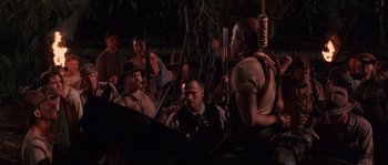 Movie still from “Rosewood” (1997), directed by John Singleton – A group of men standing next to each other holding guns; Medium shot, Low angle
