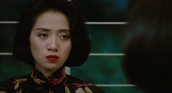 Movie still from “Rouge” (1987), directed by Stanley Kwan – A person wearing a dress; Close Up shot, Over the shoulder angle