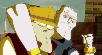 Movie still from “Round Da Way” (2009), directed by Emmanuel Klotz – A cartoon of two people with a hat on their head; Close Up shot, Low angle