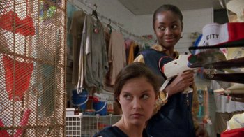 Movie still from “Ruby in Paradise” (1993), directed by Victor Nunez – Two women are standing in front of a mirror; Medium shot, Low angle