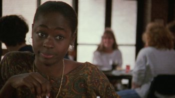 Movie still from “Ruby in Paradise” (1993), directed by Victor Nunez – A young woman sitting in front of two other women; Close Up shot, Over the shoulder angle
